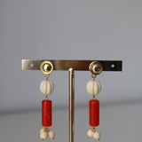 Pendientes botón rojo hueso