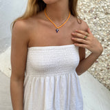 Collar crochet cruz naranja