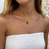 Collar crochet cruz naranja