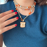 Collar cerámica tostada huevo