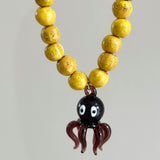 Purple and yellow octopus necklace