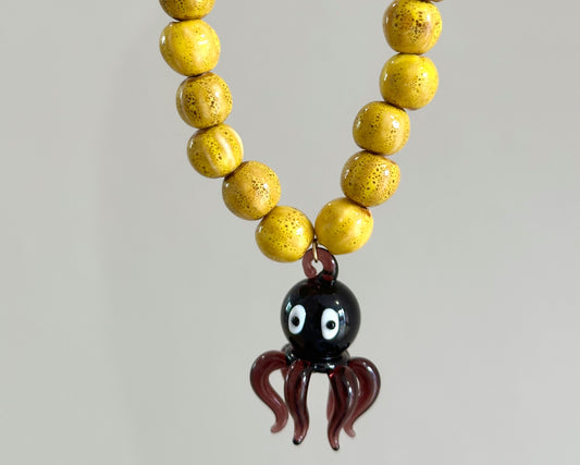 Purple and yellow octopus necklace