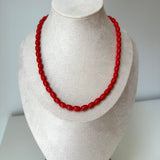 Collar rojo anaranjado