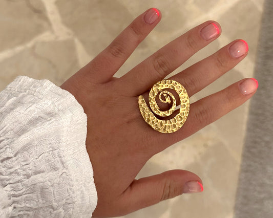 Golden conch ring